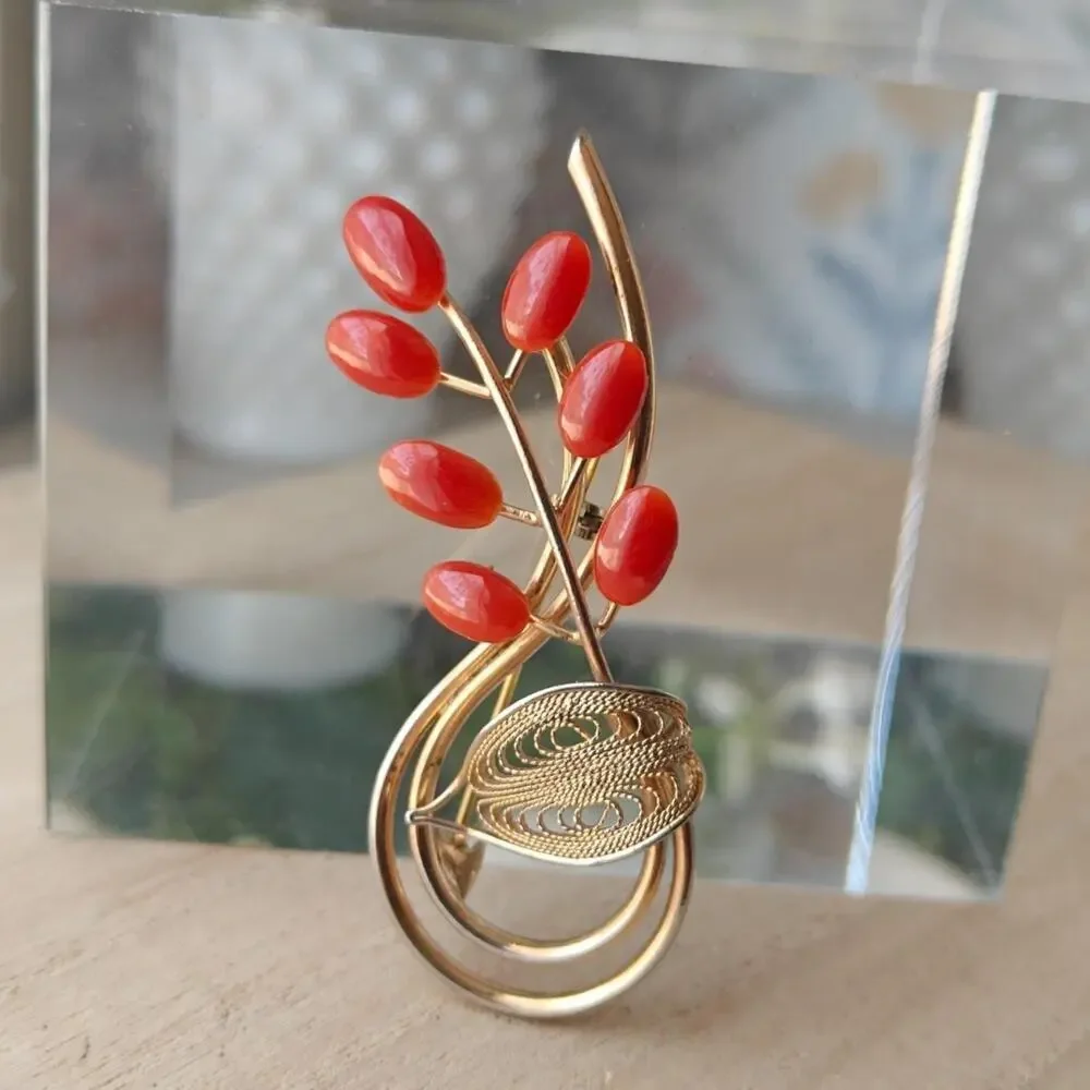 Vintage dark coral and gold tone floral spiral brooch